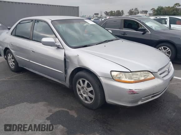 2002 Honda Accord LX with VIN 3HGCG66512G705744, listed as a IAAI auction lot 42549635 with 107,453 mi miles and . Bid and sale history available at DreamBid. Image 1.