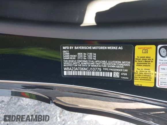 2022 BMW 4 Series 430i with VIN WBA23AT06NCJ10779, listed as a IAAI auction lot 42000961 with 49,634 mi miles and . Bid and sale history available at DreamBid. Image 9.