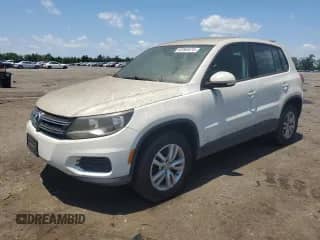 2014 Volkswagen Tiguan SEL with VIN WVGAV3AX6EW603358, listed as a Copart auction lot 62065575 with 209,464 mi miles and Clean title. Bid and sale history available at DreamBid. Image 1.