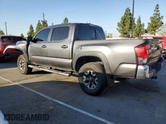 2017 Toyota Tacoma SR5 with VIN 3TMAZ5CN9HM035496, listed as a Copart auction lot 82316145 with 110,087 mi miles and Salvage title. Bid and sale history available at DreamBid. Image 2.