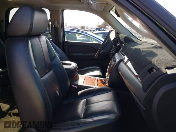 2007 Chevrolet Tahoe LTZ with VIN 1GNFC13087R389132, listed as a IAAI auction lot 42057161 with 191,673 mi miles and . Bid and sale history available at DreamBid. Image 5.