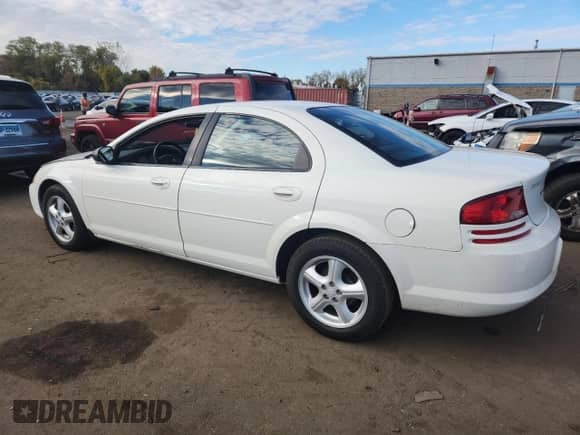 2006 Dodge Stratus SXT with VIN 1B3EL46XX6N197040, listed as a Copart auction lot 87235055 with 90,828 mi miles and Salvage title. Bid and sale history available at DreamBid. Image 2.