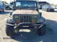 1992 Jeep Wrangler with VIN 2J4FY29S7NJ543564, listed as a IAAI auction lot 43547447 with Not provided miles and . Bid and sale history available at DreamBid. Image 6.