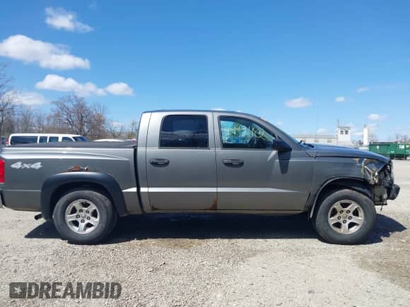 2006 Dodge Dakota SLT with VIN 1D7HW48KX6S547519, listed as a IAAI auction lot 41971182 with 205,859 mi miles and . Bid and sale history available at DreamBid. Image 14.