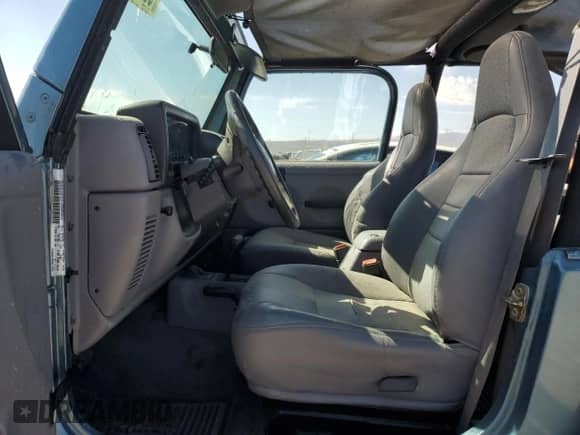 1998 Jeep Wrangler Sport z VIN 1J4FY19S5WP798597, wystawiony jako Copart lot #68707305 z przebiegiem Nie podano mil oraz Szkoda całkowita • Salvage title. Historia ofert i sprzedaży dostępna na DreamBid. Obrazek 7.