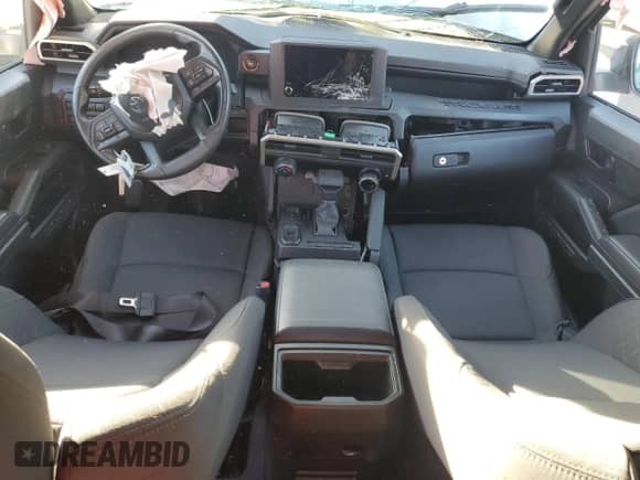2024 Toyota Tacoma SR with VIN 3TYKD5HN9RT002032, listed as a Copart auction lot 88295185 with 6,144 mi miles and Salvage title. Bid and sale history available at DreamBid. Image 8.