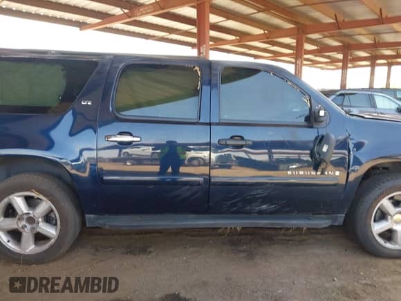 2007 Chevrolet Suburban LT z VIN 1GNFK163X7J356317, wystawiony jako IAAI lot #43061959 z przebiegiem 190 853 mil mil oraz . Historia ofert i sprzedaży dostępna na DreamBid. Obrazek 13.