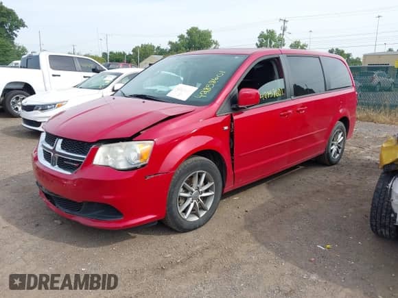 2014 Dodge Grand Caravan SE with VIN 2C4RDGBG9ER194233, listed as a IAAI auction lot 42858601 with 121,650 mi miles and . Bid and sale history available at DreamBid. Image 2.