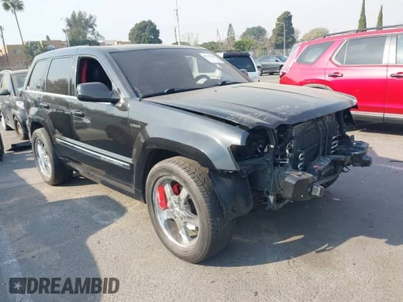 2009 Jeep Grand Cherokee with VIN 1J8HR78W49C550879, listed as a IAAI auction lot 41279386 with 126,314 mi miles and . Bid and sale history available at DreamBid. Image 1.