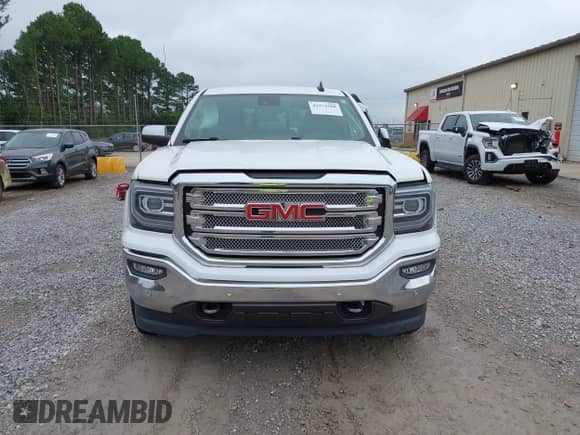 2018 GMC Sierra 1500 SLT z VIN 3GTU2NECXJG634683, wystawiony jako IAAI lot #43374368 z przebiegiem 76 104 mil mil oraz . Historia ofert i sprzedaży dostępna na DreamBid. Obrazek 12.