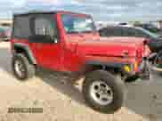 2000 Jeep Wrangler SE with VIN 1J4FA29P4YP798115, listed as a Copart auction lot 80751605 with 119,345 mi miles and Salvage title. Bid and sale history available at DreamBid. Image 4.