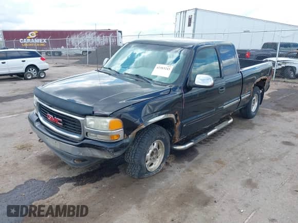 2000 GMC Sierra 1500 SLE z VIN 1GTEK19T8YZ313906, wystawiony jako IAAI lot #42383243 z przebiegiem 134 150 mil mil oraz . Historia ofert i sprzedaży dostępna na DreamBid. Obrazek 2.