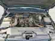 2005 Chevrolet Silverado 1500 Work Truck z VIN 1GCEC19X45Z205617, wystawiony jako Copart lot #80841085 z przebiegiem 167 998 mil mil oraz Czysty tytuł • Clean title. Historia ofert i sprzedaży dostępna na DreamBid. Obrazek 11.