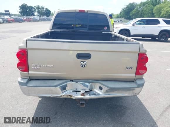 2005 Dodge Dakota SLT with VIN 1D7HW48N95S269592, listed as a IAAI auction lot 42675637 with 153,456 mi miles and . Bid and sale history available at DreamBid. Image 14.