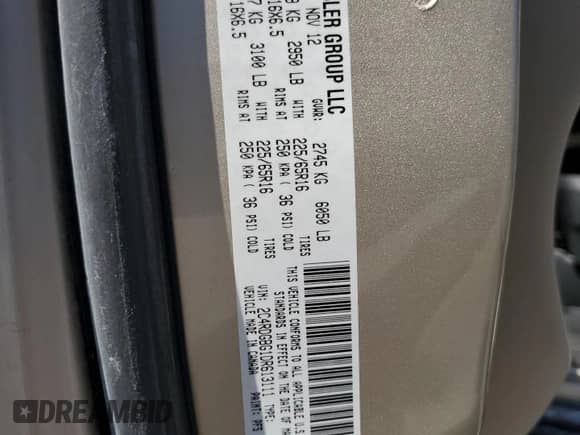 2013 Dodge Grand Caravan American Value with VIN 2C4RDGBG1DR613111, listed as a Copart auction lot 81889615 with 115,629 mi miles and Clean title. Bid and sale history available at DreamBid. Image 13.