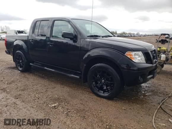 2021 Nissan Frontier Pro-4X with VIN 1N6ED0EB1MN720823, listed as a Copart auction lot 54444615 with 28,764 mi miles and Salvage title. Bid and sale history available at DreamBid. Image 4.