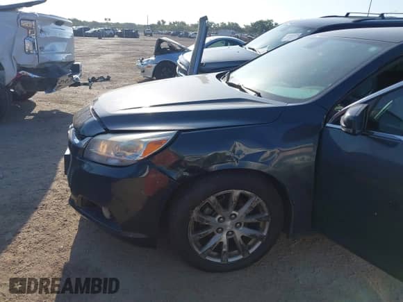 2014 Chevrolet Malibu LTZ with VIN 1G11H5SL4EF209370, listed as a IAAI auction lot 43001036 with 173,102 mi miles and . Bid and sale history available at DreamBid. Image 12.