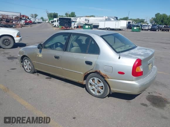 2002 Hyundai Accent GL z VIN KMHCG45C62U336245, wystawiony jako IAAI lot #42312838 z przebiegiem 310 753 mil mil oraz . Historia ofert i sprzedaży dostępna na DreamBid. Obrazek 3.