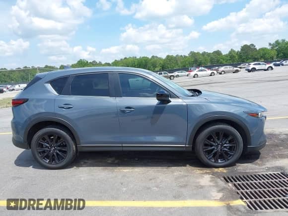 2022 Mazda CX-5 S Preferred z VIN JM3KFBCM9N0584253, wystawiony jako IAAI lot #42142889 z przebiegiem 77 104 mil mil oraz . Historia ofert i sprzedaży dostępna na DreamBid. Obrazek 13.