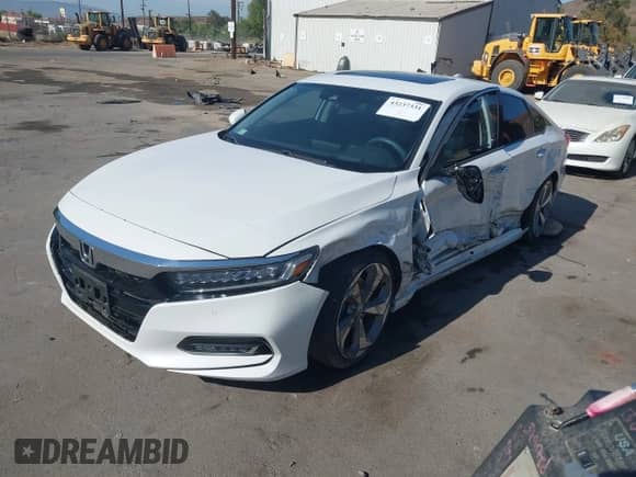 2018 Honda Accord Touring with VIN 1HGCV1F95JA146448, listed as a IAAI auction lot 43237331 with 28,446 mi miles and . Bid and sale history available at DreamBid. Image 2.