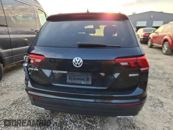 2020 Volkswagen Tiguan S с VIN 3VV0B7AX9LM084093, выставлен на аукционе Copart как лот 70844015 с пробегом 60 514 миль миль и Списание • Salvage title. История ставок и продаж доступна на DreamBid. Изображение 6.
