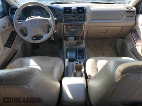 2000 Honda Passport LX with VIN 4S6CK58W6Y4400438, listed as a Copart auction lot 82210735 with 190,901 mi miles and Salvage title. Bid and sale history available at DreamBid. Image 8.