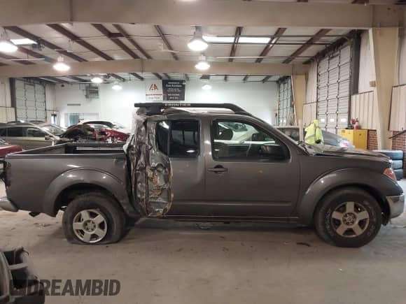 2006 Nissan Frontier LE with VIN 1N6AD07U76C414981, listed as a IAAI auction lot 41536352 with 217,560 mi miles and . Bid and sale history available at DreamBid. Image 14.