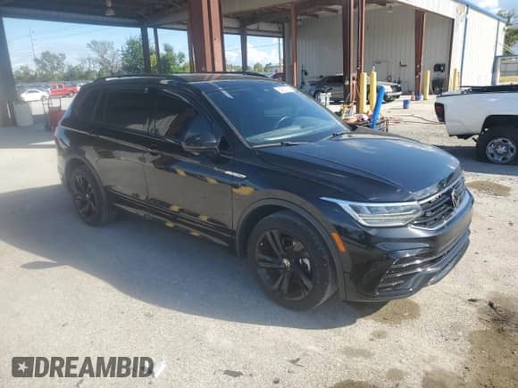2023 Volkswagen Tiguan SE R-Line Black с VIN 3VVCB7AX8PM016094, выставлен на аукционе Copart как лот 84230795 с пробегом 43 297 миль миль и Списание • Salvage title. История ставок и продаж доступна на DreamBid. Изображение 4.