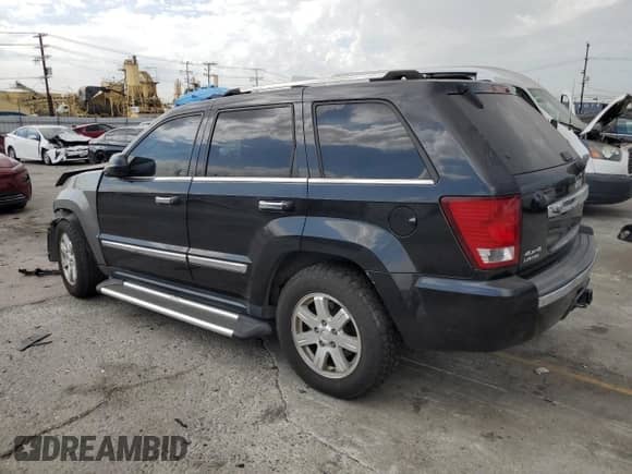 2010 Jeep Grand Cherokee Limited z VIN 1J4RR5GT6AC123709, wystawiony jako Copart lot #71228535 z przebiegiem 211 576 mil mil oraz Szkoda całkowita • Salvage title. Historia ofert i sprzedaży dostępna na DreamBid. Obrazek 2.