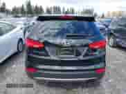 2015 Hyundai Santa Fe z VIN 5XYZWDLA2FG245029, wystawiony jako IAAI lot #42021999 z przebiegiem 135 021 mil mil oraz . Historia ofert i sprzedaży dostępna na DreamBid. Obrazek 16.
