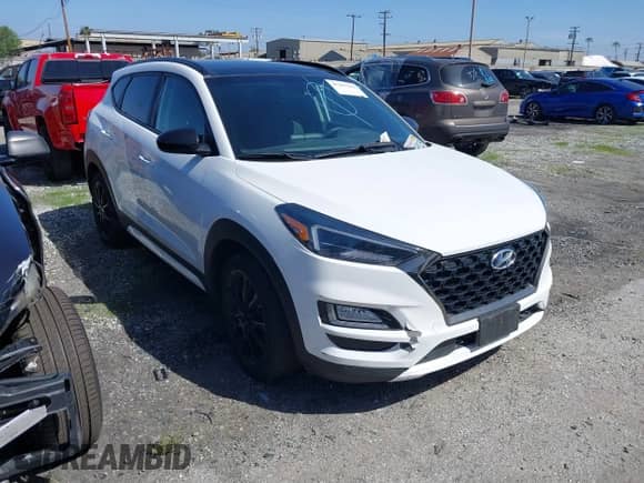 2019 Hyundai Tucson Sport z VIN KM8J33AL9KU952203, wystawiony jako IAAI lot #41367112 z przebiegiem 89 186 mil mil oraz . Historia ofert i sprzedaży dostępna na DreamBid. Obrazek 1.