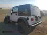 2003 Jeep Wrangler X z VIN 1J4FA39S63P356911, wystawiony jako Copart lot #81295295 z przebiegiem 92 861 mil mil oraz Szkoda całkowita • Salvage title. Historia ofert i sprzedaży dostępna na DreamBid. Obrazek 2.