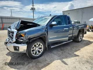 2014 GMC Sierra 1500 SLT with VIN 1GTV2VEC0EZ362946, listed as a Copart auction lot 64040495 with 144,224 mi miles and Salvage title. Bid and sale history available at DreamBid. Image 1.