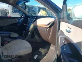 2016 Hyundai Santa Fe z VIN 5XYZTDLB5GG345547, wystawiony jako IAAI lot #43526259 z przebiegiem 188 156 mil mil oraz . Historia ofert i sprzedaży dostępna na DreamBid. Obrazek 5.