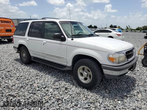 1998 Ford Explorer XL z VIN 1FMZU32X7WZB87549, wystawiony jako Copart lot #60970165 z przebiegiem 186 022 mil mil oraz Szkoda całkowita • Salvage title. Historia ofert i sprzedaży dostępna na DreamBid. Obrazek 4.