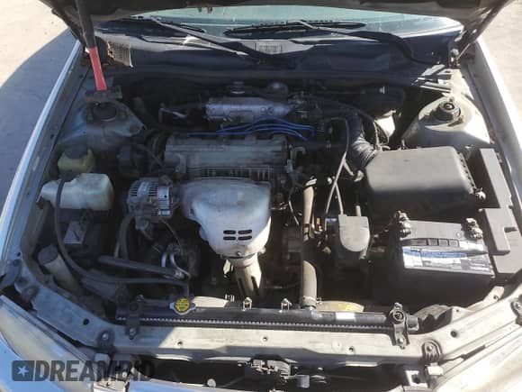 2000 Toyota Camry LE z VIN JT2BG22K3Y0510863, wystawiony jako Copart lot #71069245 z przebiegiem Nie podano mil oraz Szkoda całkowita • Salvage title. Historia ofert i sprzedaży dostępna na DreamBid. Obrazek 11.