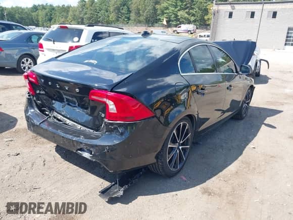 2016 Volvo S60 T5 Drive-E Premier z VIN YV126MFK0G2407087, wystawiony jako IAAI lot #43153662 z przebiegiem 60 933 mil mil oraz . Historia ofert i sprzedaży dostępna na DreamBid. Obrazek 4.