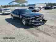 2014 Dodge Challenger SXT z VIN 2C3CDYAG5EH229969, wystawiony jako Copart lot #85288785 z przebiegiem 194 859 mil mil oraz Szkoda całkowita • Salvage title. Historia ofert i sprzedaży dostępna na DreamBid. Obrazek 13.
