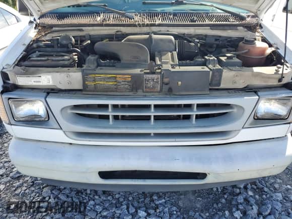 2000 Ford Econoline Cargo z VIN 1FTNE24L1YHB02766, wystawiony jako Copart lot #83772725 z przebiegiem 119 156 mil mil oraz Czysty tytuł • Clean title. Historia ofert i sprzedaży dostępna na DreamBid. Obrazek 12.