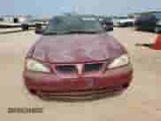 2004 Pontiac Grand Am SE with VIN 1G2NE52F44M563674, listed as a Copart auction lot 56692715 with 197,843 mi miles and Salvage title. Bid and sale history available at DreamBid. Image 5.