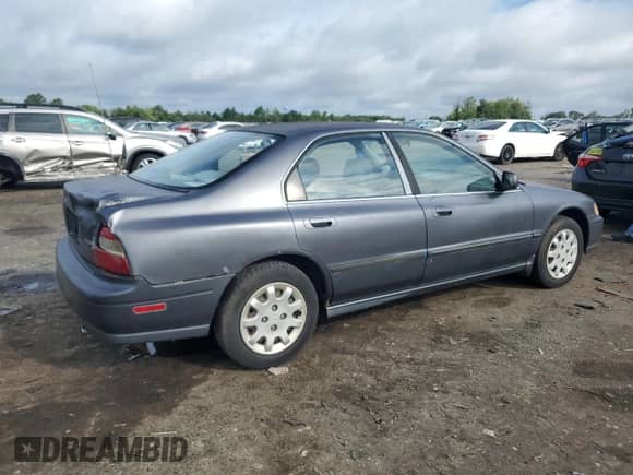 1995 Honda Accord LX z VIN 1HGCD5538SA042335, wystawiony jako Copart lot #65115405 z przebiegiem 272 051 mil mil oraz Szkoda całkowita • Salvage title. Historia ofert i sprzedaży dostępna na DreamBid. Obrazek 3.