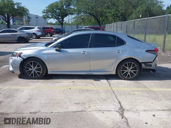 2023 Toyota Camry SE с VIN 4T1G11AK5PU760425, выставлен на аукционе IAAI как лот 42372394 с пробегом 201 407 миль миль и . История ставок и продаж доступна на DreamBid. Изображение 14.