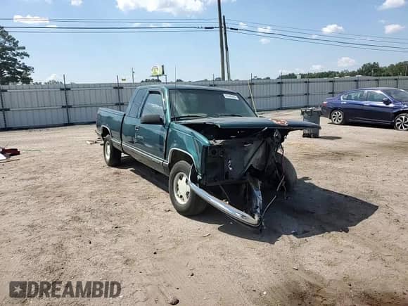 1998 GMC Sierra 1500 z VIN 1GTEC19M4WE509786, wystawiony jako Copart lot #80640605 z przebiegiem 220 444 mil mil oraz Szkoda całkowita • Salvage title. Historia ofert i sprzedaży dostępna na DreamBid. Obrazek 14.