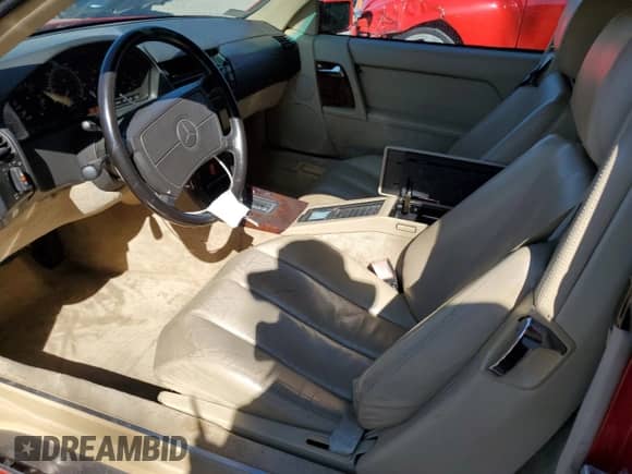 1991 Mercedes-Benz 500 с VIN WDBFA66EXMF021808, выставлен на аукционе Copart как лот 68593955 с пробегом 48 327 миль миль и Чистый • Clean title. История ставок и продаж доступна на DreamBid. Изображение 7.