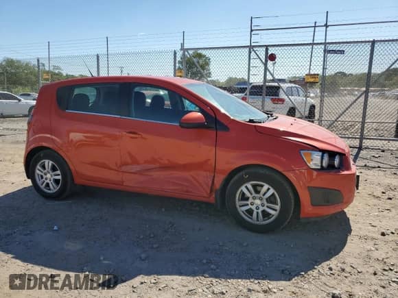 2012 Chevrolet Sonic LT with VIN 1G1JC6SH3C4223608, listed as a Copart auction lot 70630065 with 104,126 mi miles and Salvage title. Bid and sale history available at DreamBid. Image 4.