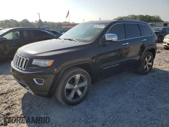 2015 Jeep Grand Cherokee High Altitude with VIN 1C4RJFCG7FC652167, listed as a Copart auction lot 66628575 with 300,077 mi miles and Salvage title. Bid and sale history available at DreamBid. Image 1.