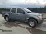 2019 Nissan Frontier S with VIN 1N6AD0ER3KN785536, listed as a Copart auction lot 64672455 with 95,137 mi miles and Salvage title. Bid and sale history available at DreamBid. Image 4.