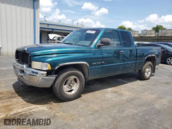 1999 Dodge 1500 with VIN 3B7HC13Z6XG119493, listed as a Copart auction lot 63879864 with 172,821 mi miles and Salvage title. Bid and sale history available at DreamBid. Image 1.