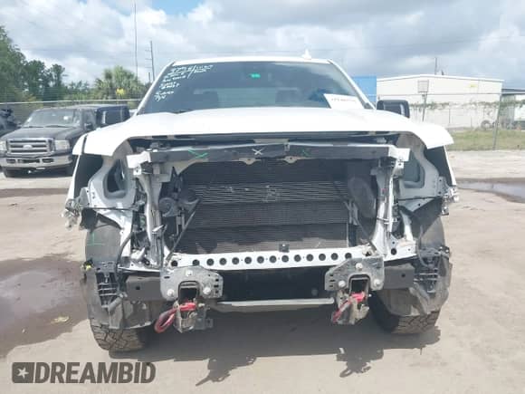 2022 GMC Sierra 1500 AT4 с VIN 1GTPUEEL2NZ523557, выставлен на аукционе IAAI как лот 42146575 с пробегом 67 958 миль миль и . История ставок и продаж доступна на DreamBid. Изображение 6.