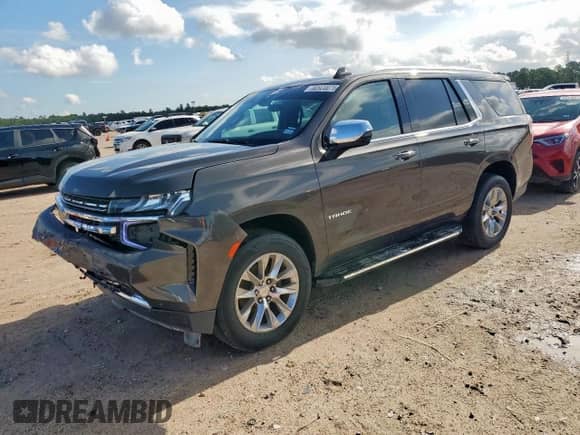 2021 Chevrolet Tahoe Premier with VIN 1GNSKSKD0MR119755, listed as a Copart auction lot 62820075 with 100,446 mi miles and Clean title. Bid and sale history available at DreamBid. Image 1.